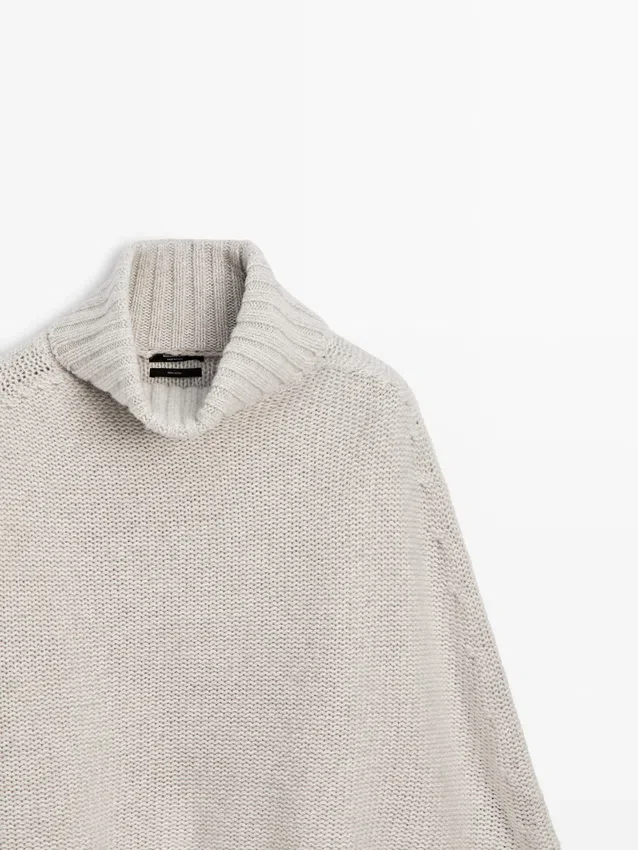 100 % Wolle Cape mit Fransen 100 % Wolle Cape mit Fransen
