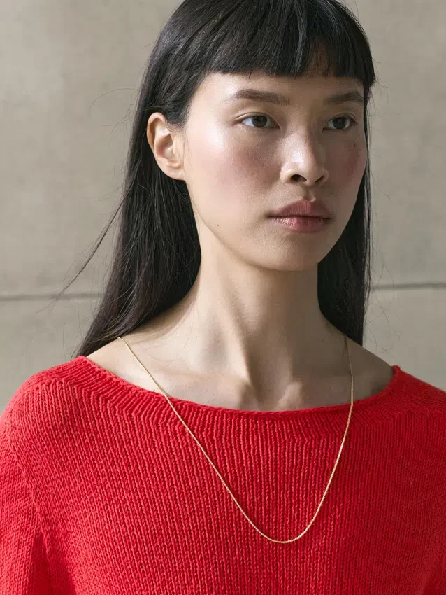 Asymmetrischer Strickpullover Asymmetrischer Strickpullover
