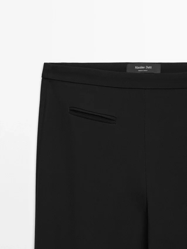 Ausgestellte Hose mit Tasche Ausgestellte Hose mit Tasche