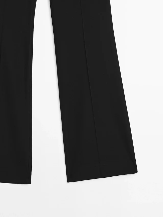 Ausgestellte Hose mit Tasche Ausgestellte Hose mit Tasche