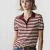 Baumwoll-Poloshirt mit gestreiften Details Baumwoll-Poloshirt mit gestreiften Details