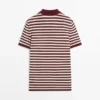 Baumwoll-Poloshirt mit gestreiften Details Baumwoll-Poloshirt mit gestreiften Details