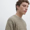 Baumwoll-Pullover mit Zopfmuster Baumwoll-Pullover mit Zopfmuster