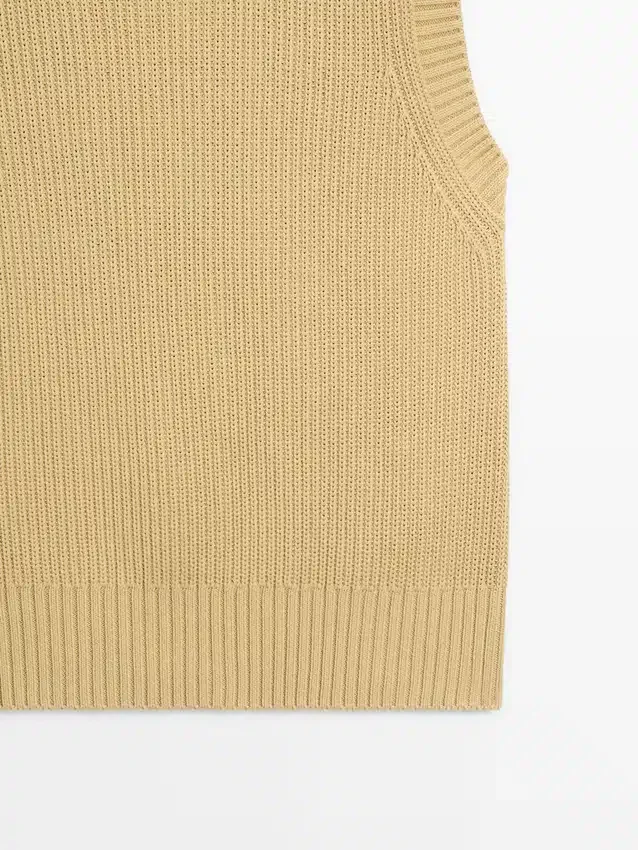 Baumwollstrickweste mit Rundhalsausschnitt Baumwollstrickweste mit Rundhalsausschnitt