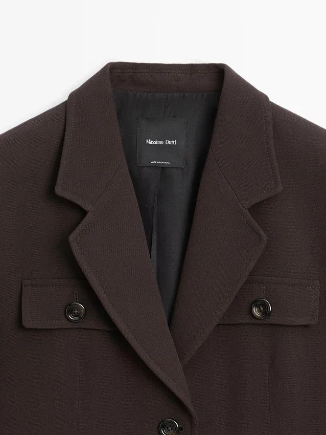 Blazer mit Taschen und Reverskragen Blazer mit Taschen und Reverskragen