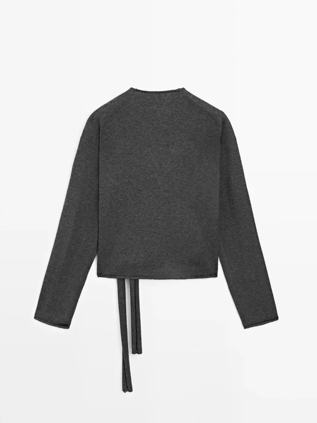 Cardigan im Wickelstil mit Spitzendetails Cardigan im Wickelstil mit Spitzendetails