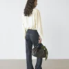 Flare-Fit-Jeans mit hoher Taille und Taschen Flare-Fit-Jeans mit hoher Taille und Taschen