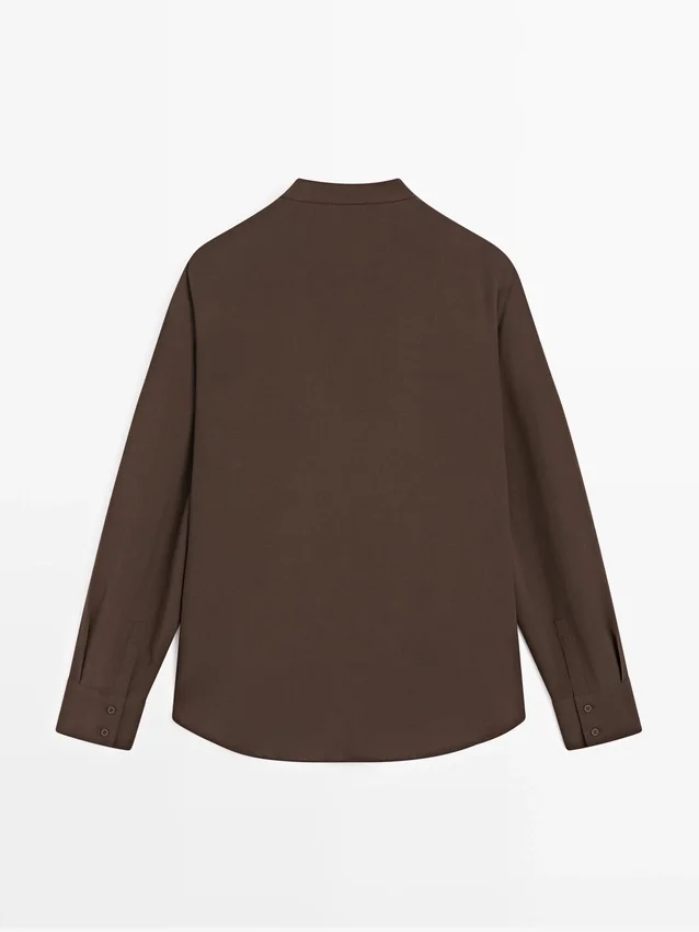 Fließende Bluse mit Rüschen Fließende Bluse mit Rüschen