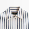 Gestreiftes Hemd aus 100 % Baumwolle Gestreiftes Hemd aus 100 % Baumwolle