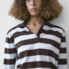 Gestreiftes Poloshirt aus Baumwollstrick Gestreiftes Poloshirt aus Baumwollstrick