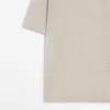 Gestricktes Poloshirt mit V-Ausschnitt Gestricktes Poloshirt mit V-Ausschnitt