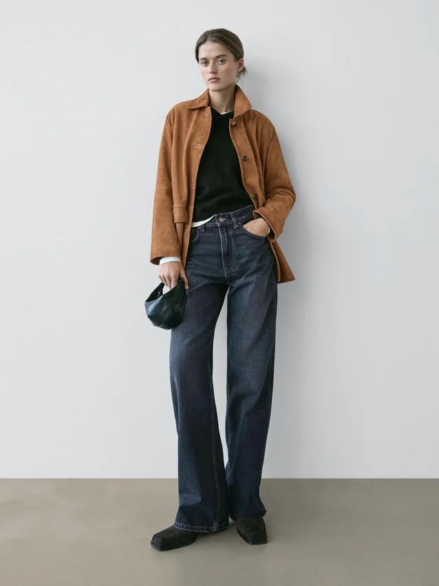Jeans mit hoher Taille und weitem Bein Jeans mit hoher Taille und weitem Bein