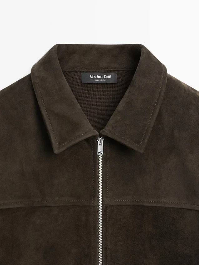Kontrastreiche Jacke aus Baumwolle und Leder Kontrastreiche Jacke aus Baumwolle und Leder
