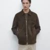 Kontrastreiche Jacke aus Baumwolle und Leder Kontrastreiche Jacke aus Baumwolle und Leder