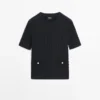 Kurzärmeliger Pullover aus geflochtenem Strick Kurzärmeliger Pullover aus geflochtenem Strick