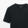 Kurzärmeliger Pullover aus geflochtenem Strick Kurzärmeliger Pullover aus geflochtenem Strick