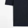 Kurzärmeliges Poloshirt aus strukturiertem Strick Kurzärmeliges Poloshirt aus strukturiertem Strick