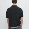 Kurzärmeliges Poloshirt aus strukturiertem Strick Kurzärmeliges Poloshirt aus strukturiertem Strick
