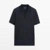 Kurzärmeliges Poloshirt aus strukturiertem Strick Kurzärmeliges Poloshirt aus strukturiertem Strick
