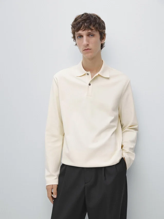 Langärmliges Poloshirt mit gerippten Details Langärmliges Poloshirt mit gerippten Details