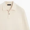 Langärmliges Poloshirt mit gerippten Details Langärmliges Poloshirt mit gerippten Details
