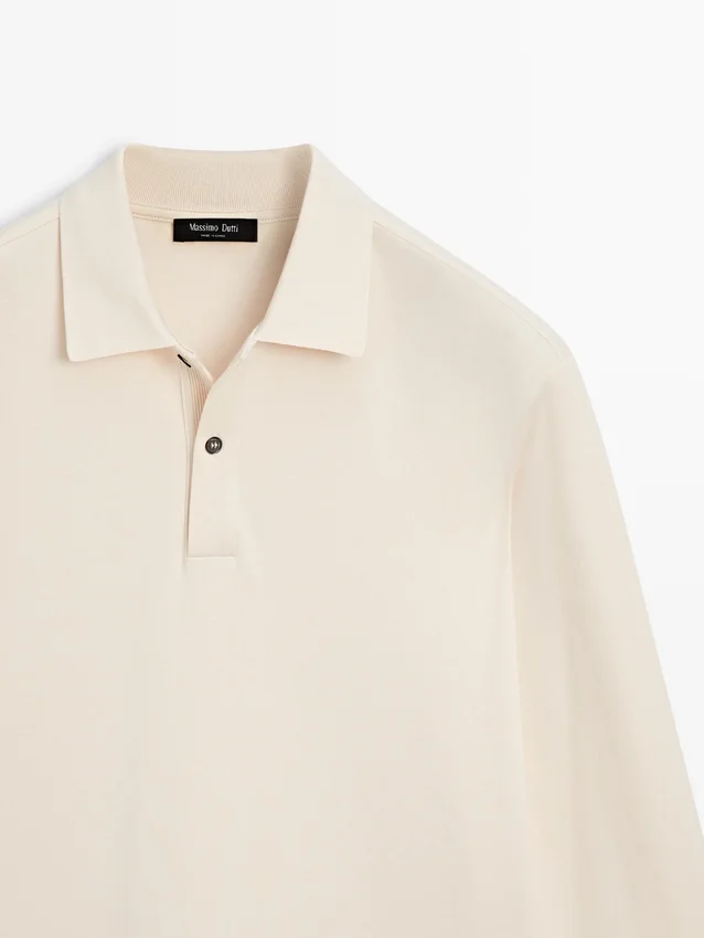 Langärmliges Poloshirt mit gerippten Details Langärmliges Poloshirt mit gerippten Details