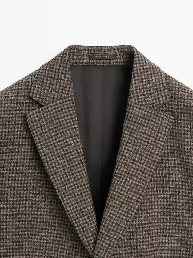Maßgeschneiderter Blazer aus Wolle mit Karomuster Maßgeschneiderter Blazer aus Wolle mit Karomuster
