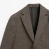 Maßgeschneiderter Blazer aus Wolle mit Karomuster Maßgeschneiderter Blazer aus Wolle mit Karomuster