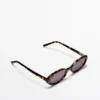 Mini-Sonnenbrille mit ovalen Gläsern im Schildpatt-Look Mini-Sonnenbrille mit ovalen Gläsern im Schildpatt-Look