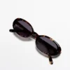 Mini-Sonnenbrille mit ovalen Gläsern im Schildpatt-Look Mini-Sonnenbrille mit ovalen Gläsern im Schildpatt-Look