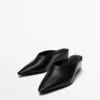 Mules mit Keilabsatz Mules mit Keilabsatz
