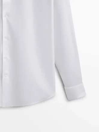 Slim-Fit-Baumwollhemd mit doppelten Manschetten Slim-Fit-Baumwollhemd mit doppelten Manschetten