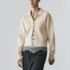 Strickcardigan mit Polokragen aus Baumwollstrick Strickcardigan mit Polokragen aus Baumwollstrick